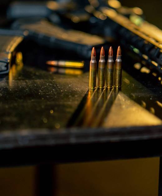 close up in a professional shooting range on black table gun shop professional equipment introductory briefing